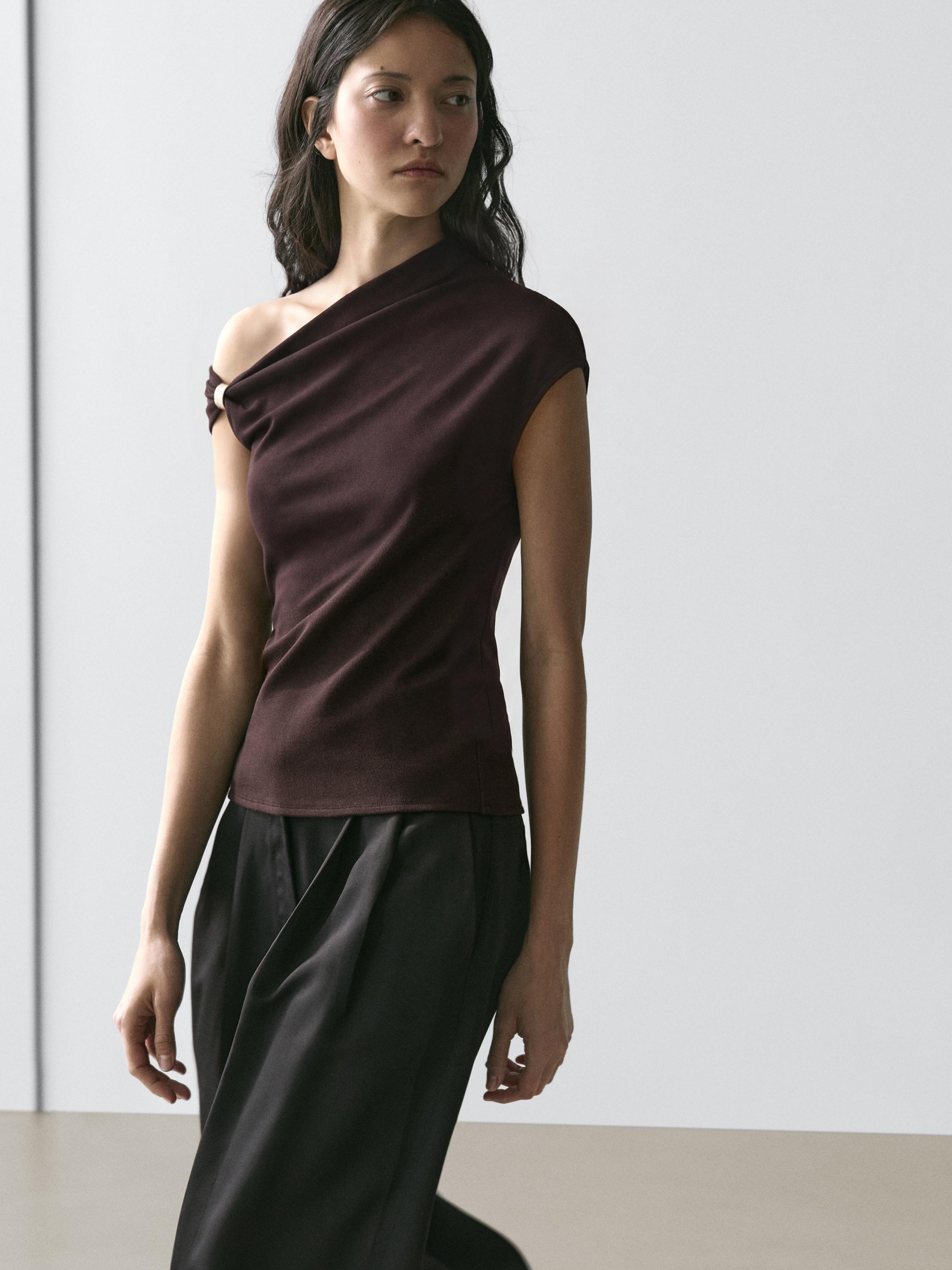 Asymmetric top with brooch detail